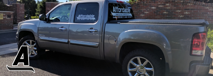 Affordable Heating & Air Conditioning truck parked outside